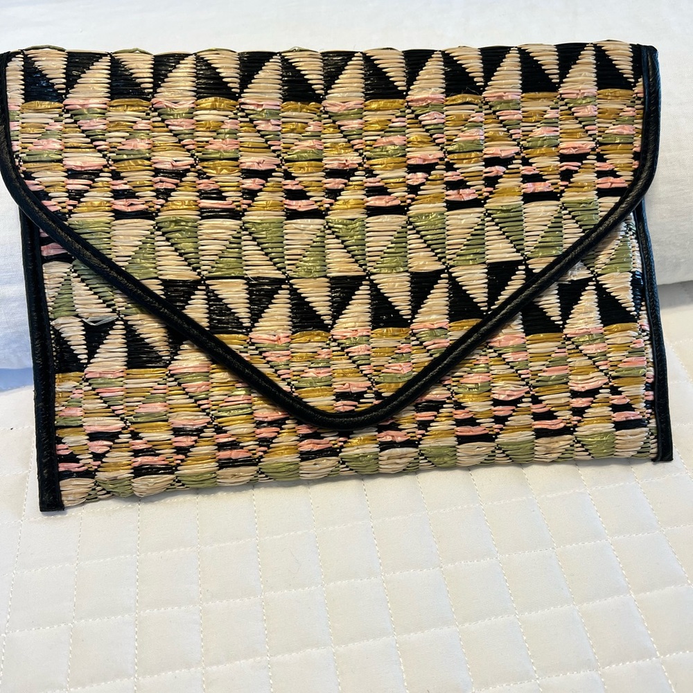 BCBG woven clutch
